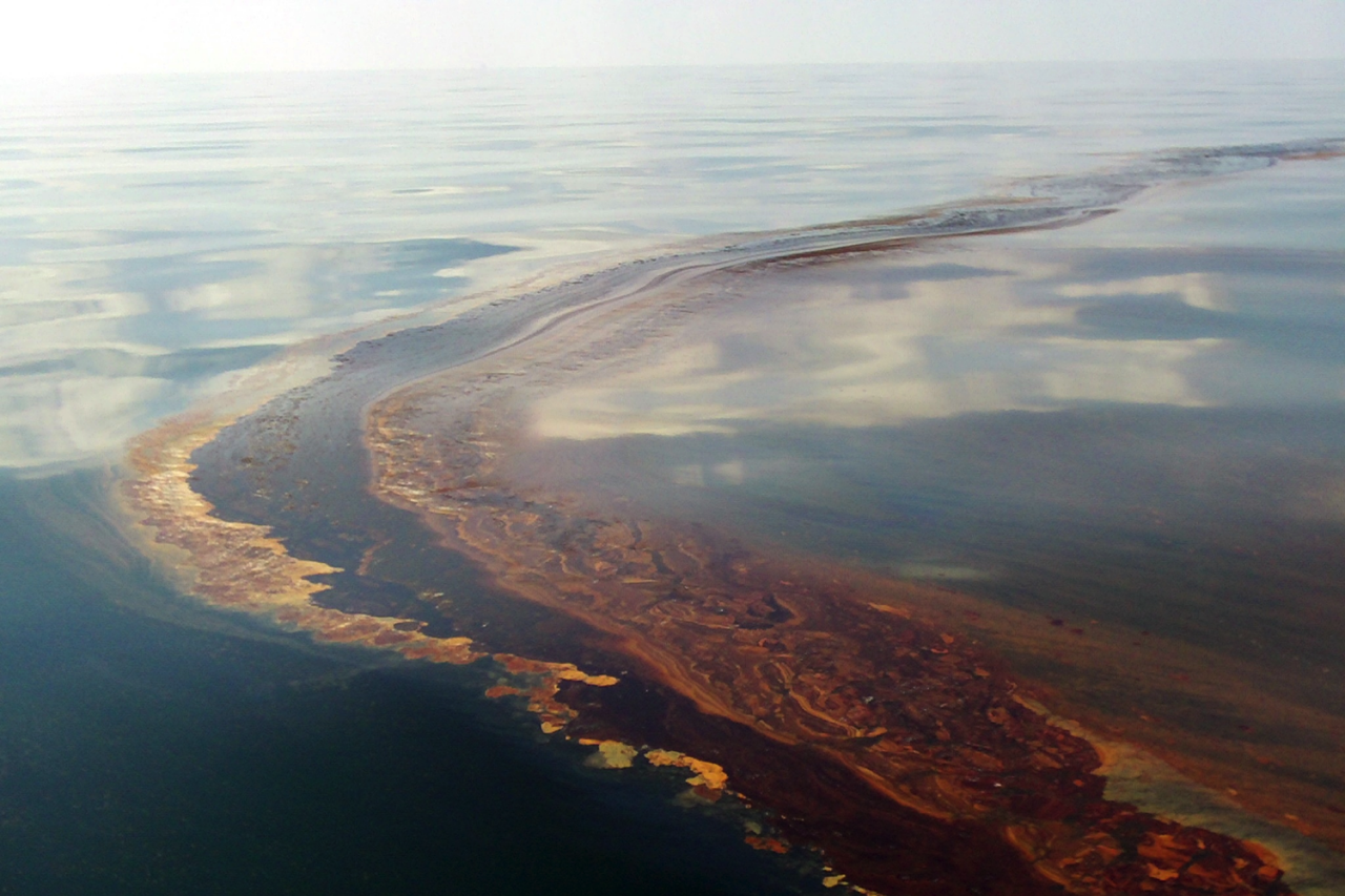 An Oil Slick stretches across a span of ocean
