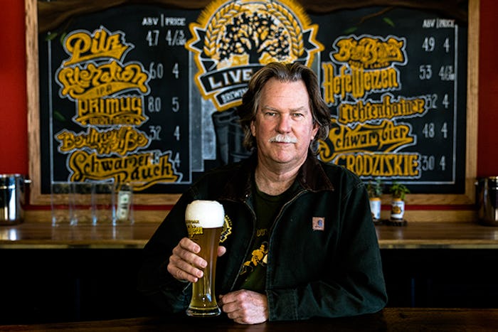 Chip McElroy behind the bar at Live Oak Brewing in Austin