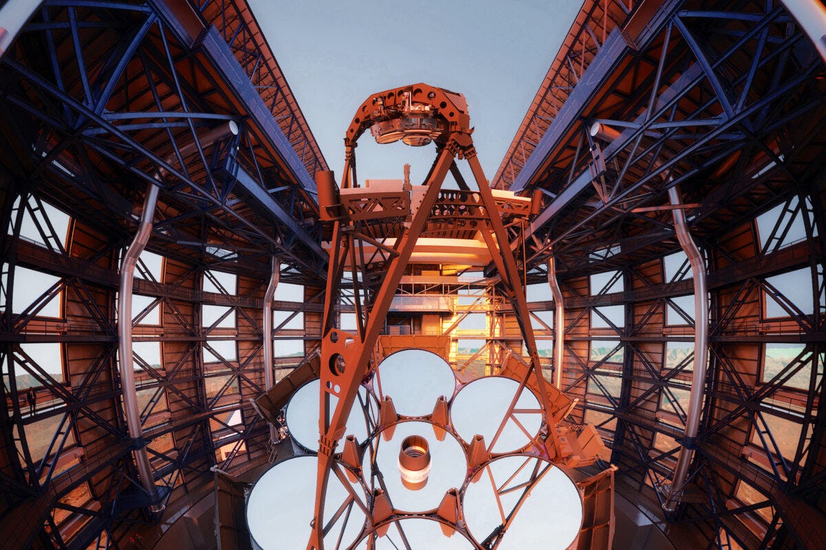An artist's rendition of a giant telescope with seven large mirrors surrounded by a structure