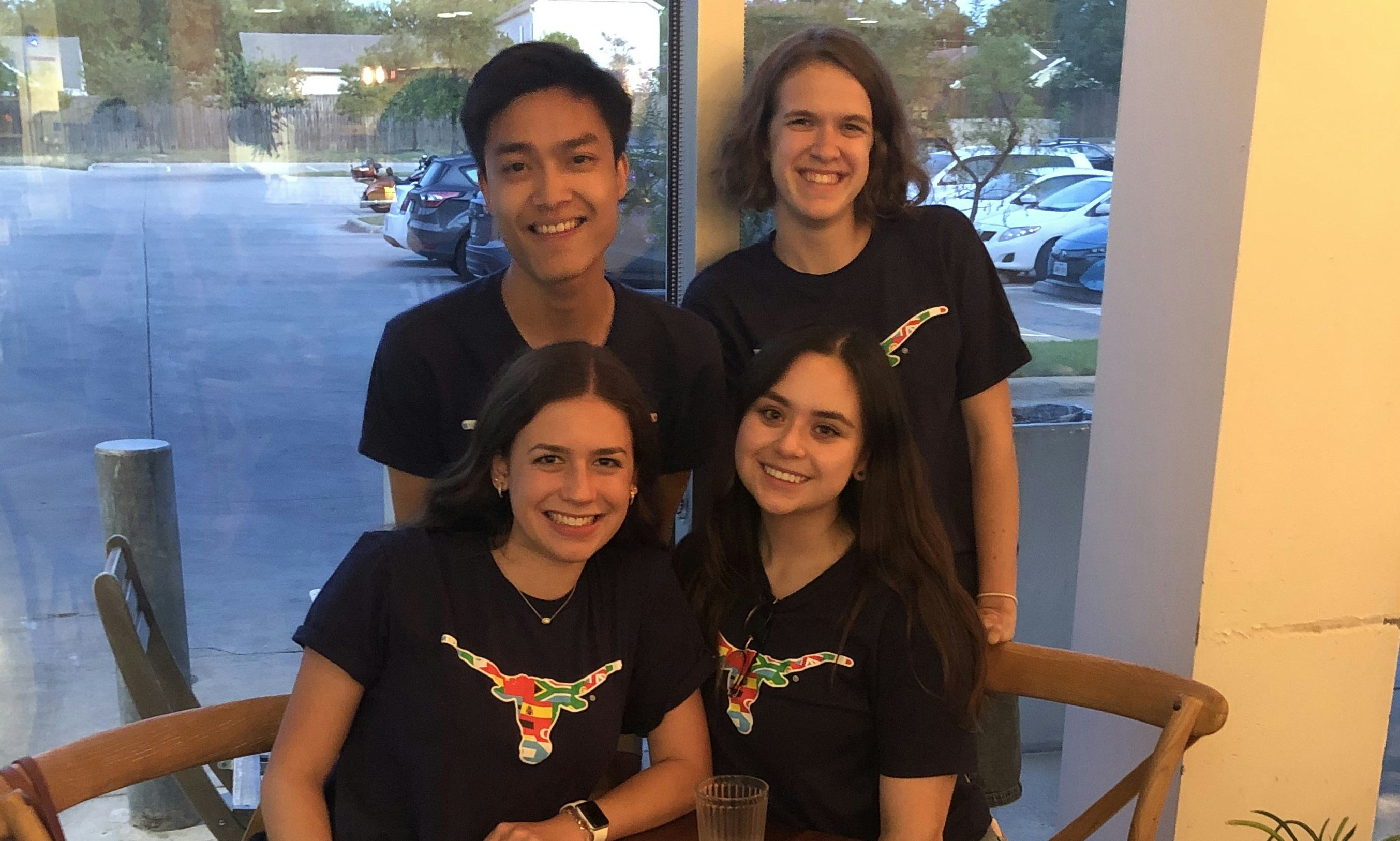 Four students in matching University of Texas tshirts